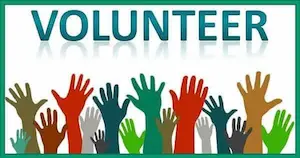 An image of raised hands volunteering.